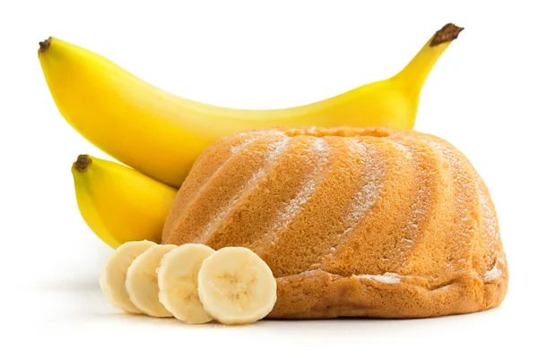 Bolo de banana e bananas no fundo branco — Fotografia de Stock