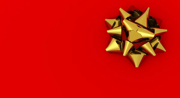 Zlatá saténová stuha izolovaných na červeném pozadí — Stock fotografie