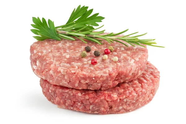 Hamburger pasteitjes en aromatische kruid geïsoleerd op witte achtergrond — Stockfoto