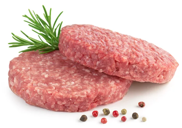 Two raw hamburger, rosemary and pepper on white background — Stock Photo, Image