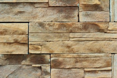 Kahverengi taş duvarına yakın çekim