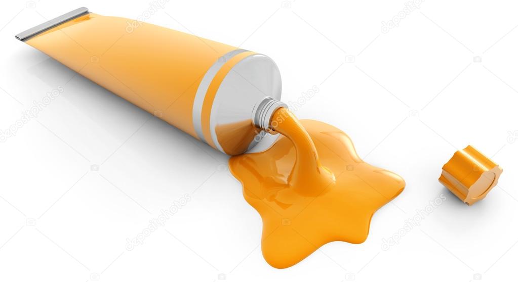 Tube of orange paint isolated on white background