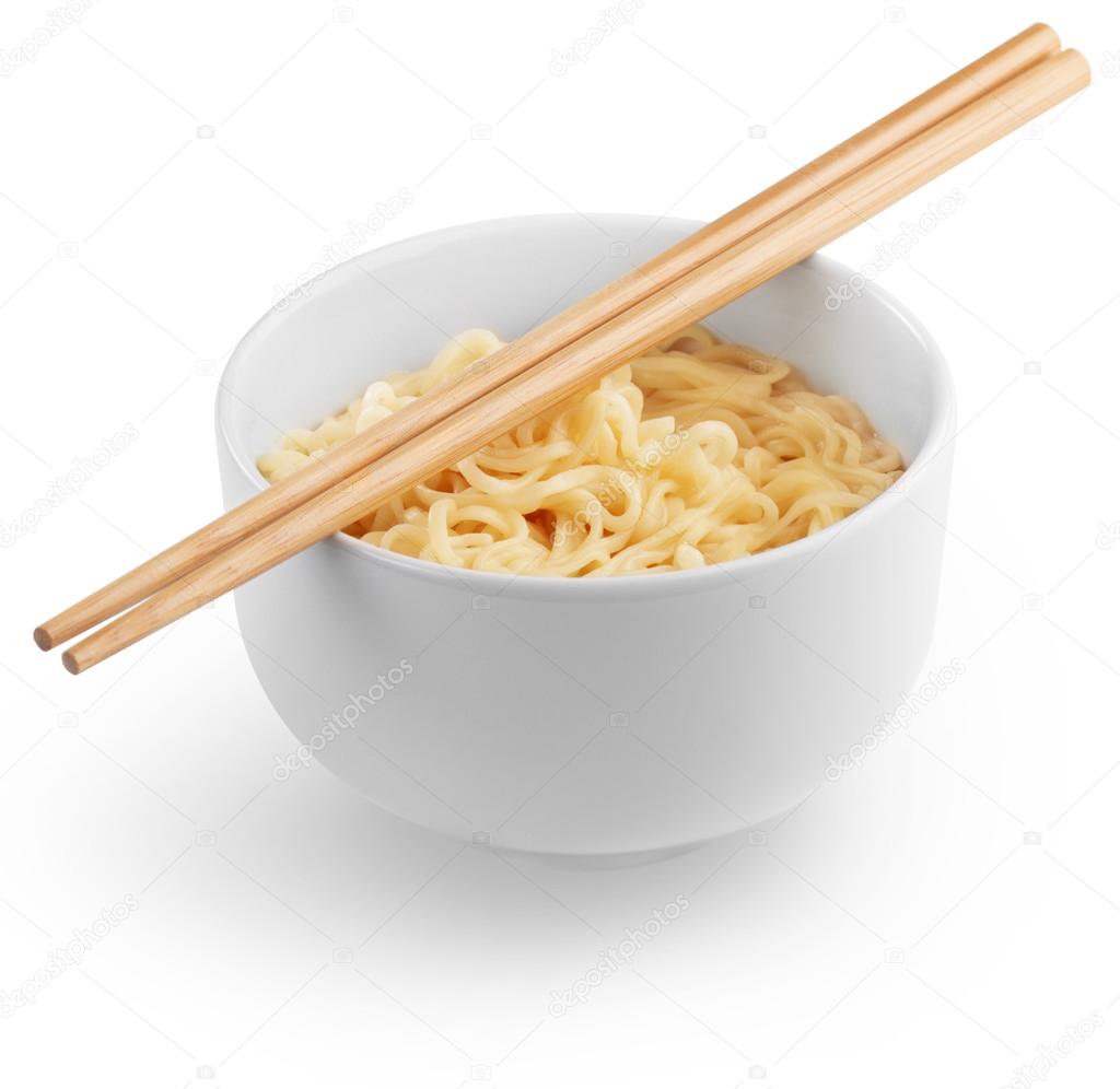 Chinese noodles in a white bowl and chopsticks
