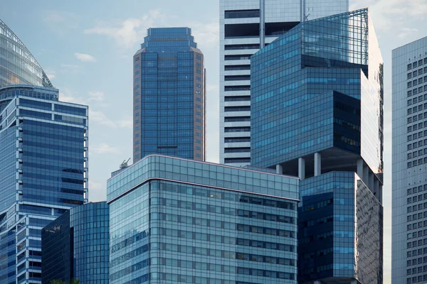 Group of glass skyscrapers under a blue sky — Stock Photo, Image