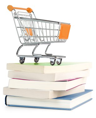 Alışveriş sepeti üzerine bir kitap yığını