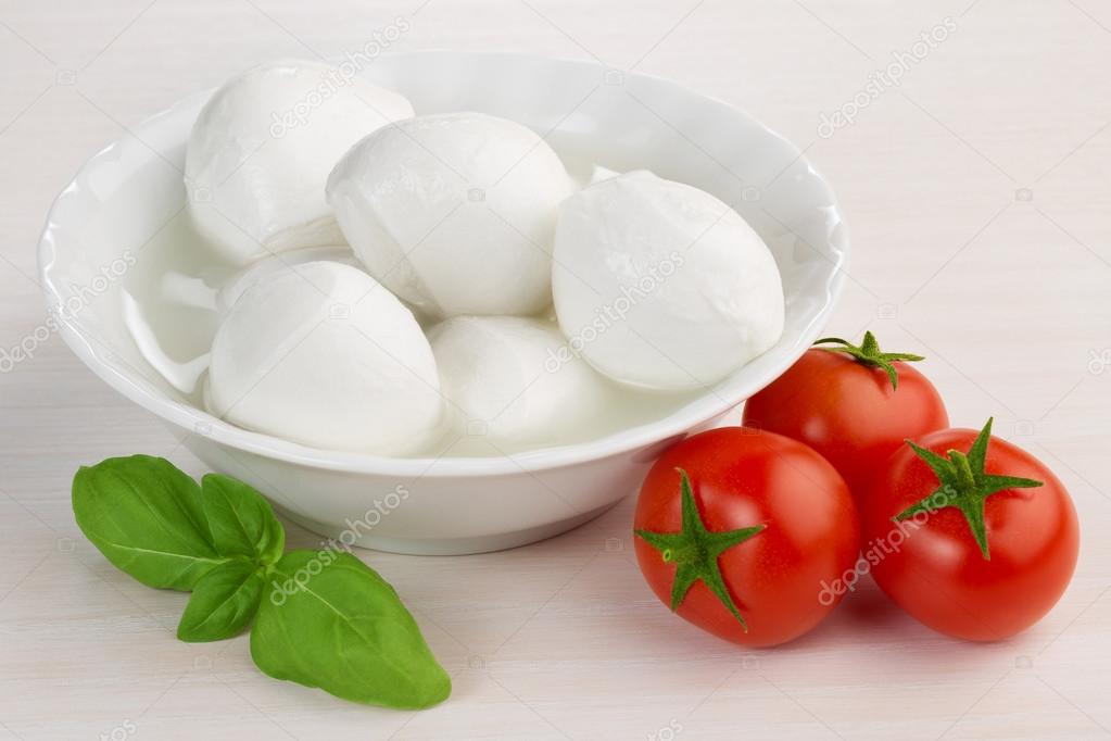 Mozzarella cheese, cherry tomatoes and basil leaf