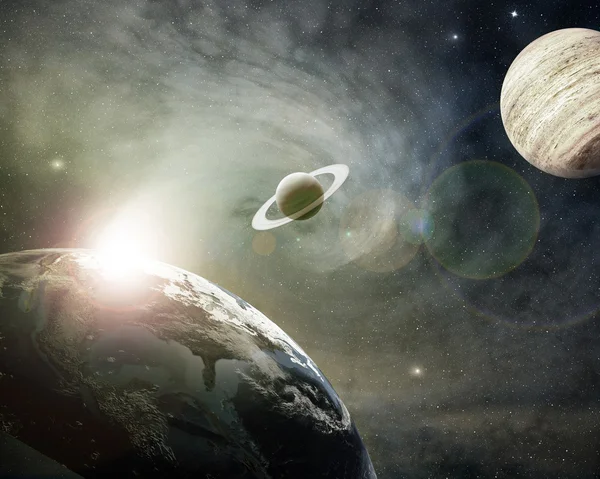 Planeta Terra, Saturno e Júpiter em uma nuvem cósmica — Fotografia de Stock