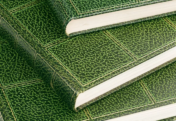 Close up of hardcover books with green leather — Stock Photo, Image