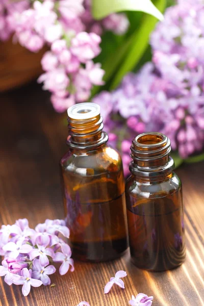 Lilac essential aroma oil — Stock Photo, Image