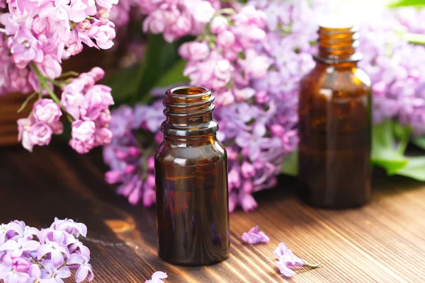 Lilac essential aroma oil — Stock Photo, Image