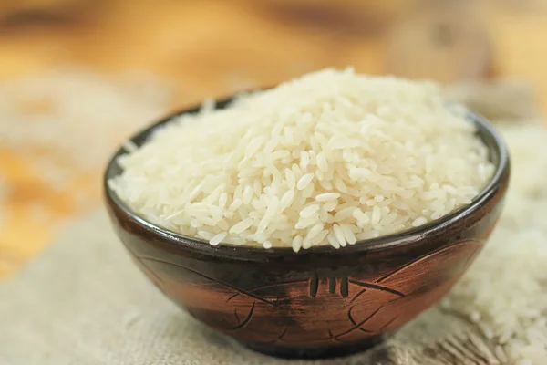 Bowl of raw rice grains