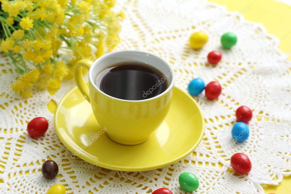 Cup of coffee and candies