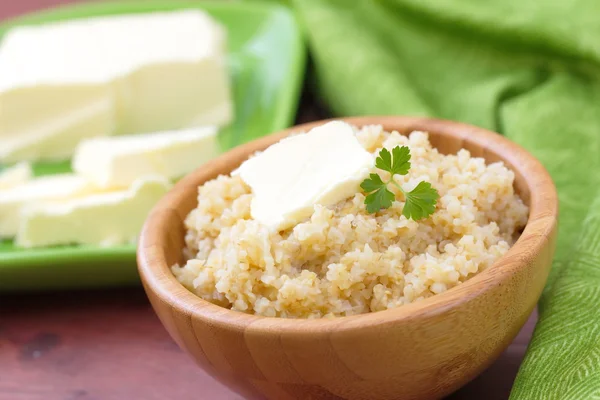 Wheat porridge with butter — Stock Photo, Image