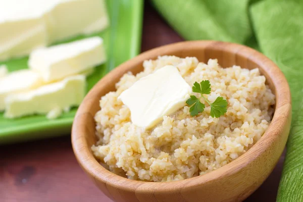 Wheat porridge with butter — Stock Photo, Image