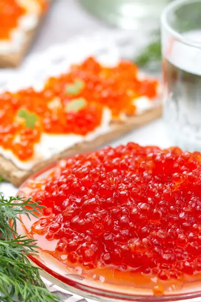 Red caviar and cold vodka — Stock Photo, Image