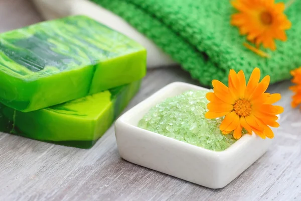 Salt and soap with herbs — Stock Photo, Image