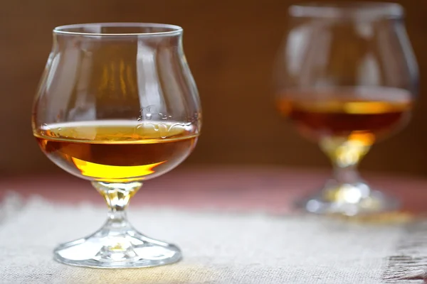 Glass of cognac on the table — Stock Photo, Image