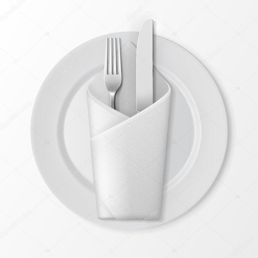 Plate with Silver Fork and Knife Folded Napkin