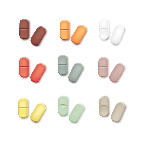 Conjunto vetorial de comprimidos multicoloridos isolados em branco —  Vetores de Stock