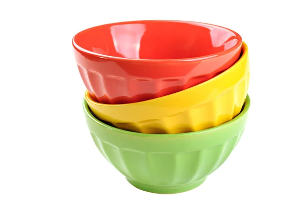 Empty, stacked, colored bowls (red, yellow, green), isolated on — Stock Photo, Image