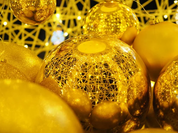large golden balls as street decorations for the new year.