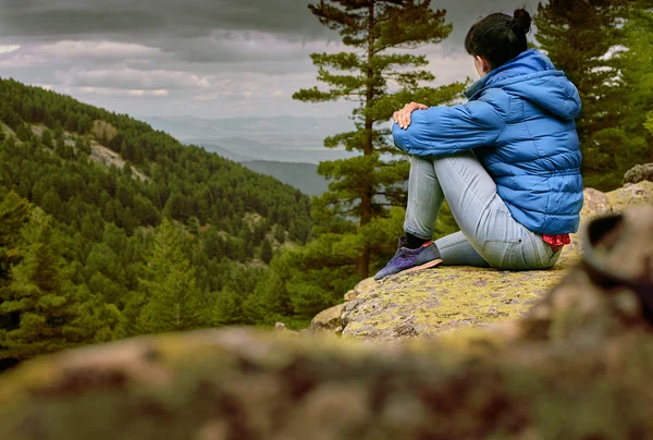 Woman hiking around mountains and having relax with beautiful landscape view - Hard way to the top concept — Stock Photo, Image