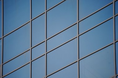 ideal lines of  glass modern windows in office building