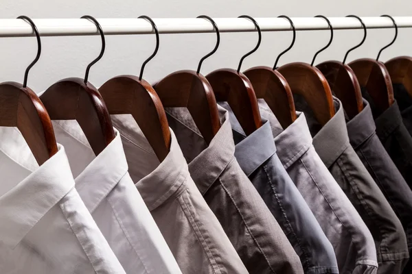 Several shirts on a hanger — Stock Photo, Image