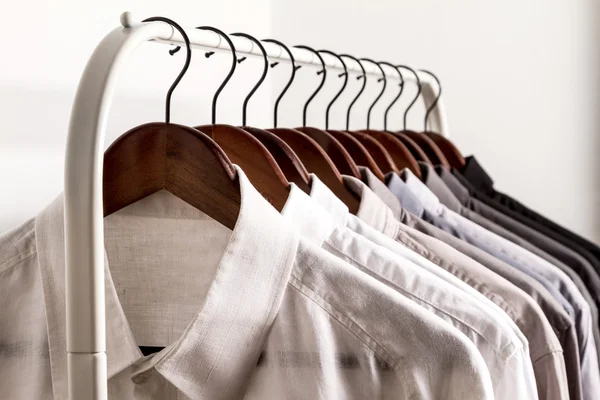 Several shirts on a hanger — Stock Photo, Image