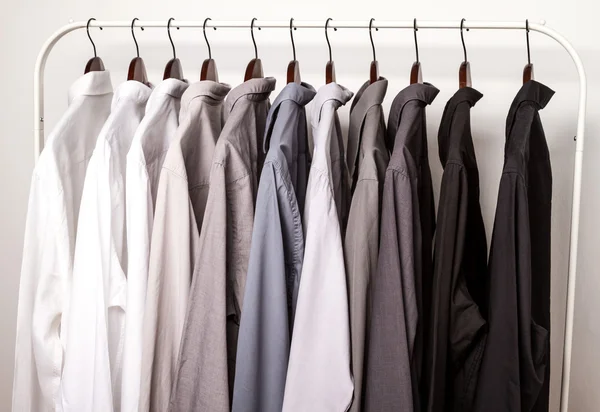Several shirts on a hanger — Stock Photo, Image