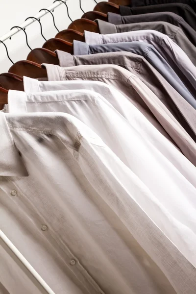 Several shirts on a hanger — Stock Photo, Image