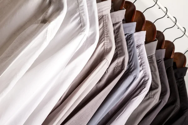 Several shirts on a hanger — Stock Photo, Image