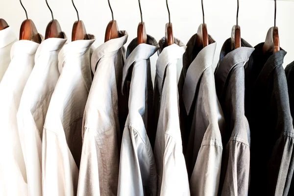 Several shirts on a hanger — Stock Photo, Image