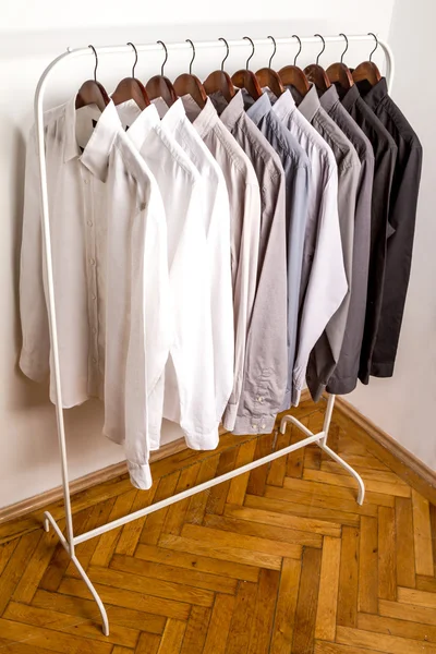 Several shirts on a hanger — Stock Photo, Image