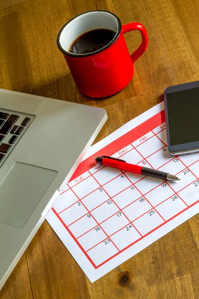 Organizing monthly activities in the calendar — Stock Photo, Image