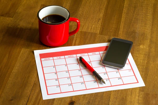 Organizing monthly activities in the calendar — Stock Photo, Image