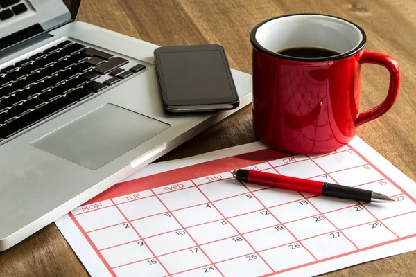 Organizování měsíční činnosti v kalendáři Stock Snímky