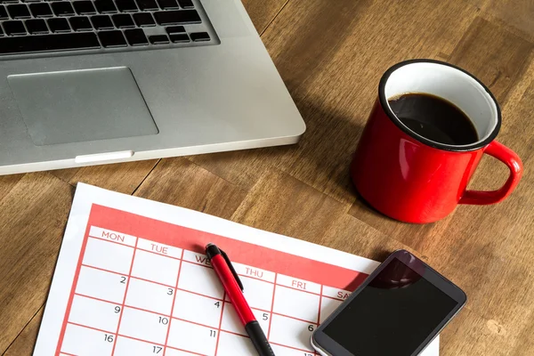 Organización de actividades mensuales en el calendario — Foto de Stock