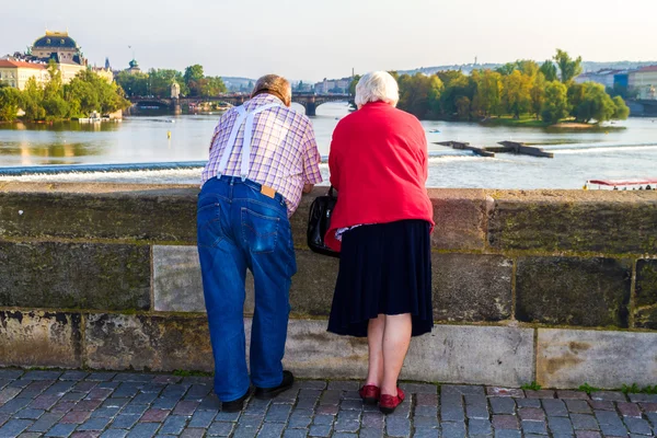 A couple looking at Prague scenery
