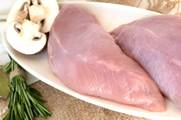 raw turkey meat fillet, chicken breast, diet white meat. Cooking food, isolate, white background.