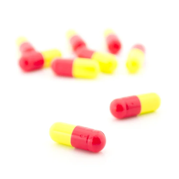 Röd gul kapsel piller — Stockfoto