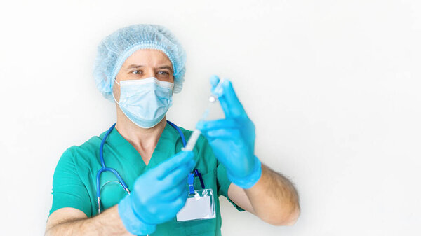 Covid-19 coronavirus vaccination concept. The doctor holds a syringe in his hands and prepares to inject his patient. Coronavirus vaccine trials. Provision of medical services for vaccination banner.