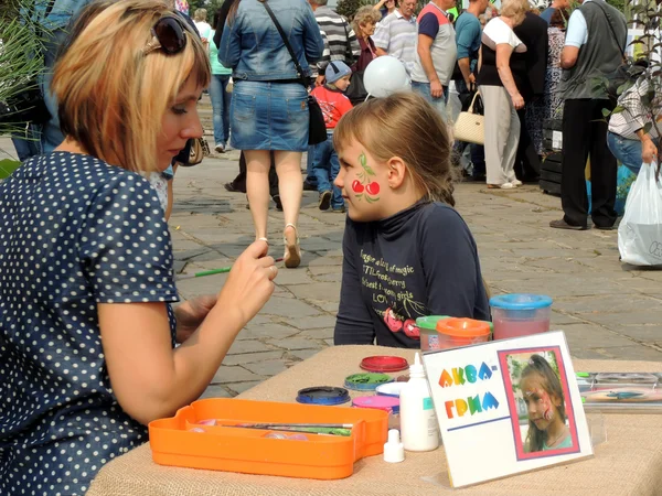 Street face painting of girl — Stock Photo, Image