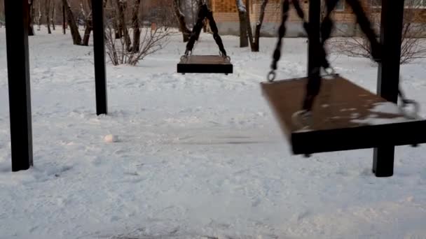 Lonely Empty Swings Metal Swing Children Carousel Moving Empty Abandoned — Stock Video