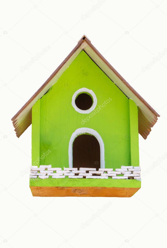 green wooden birdhouse isolated on white background. handmade bird house