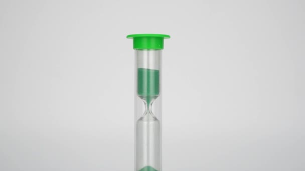 Medical Hourglass Sand Measures Time Green Sand Pours — Stock Video