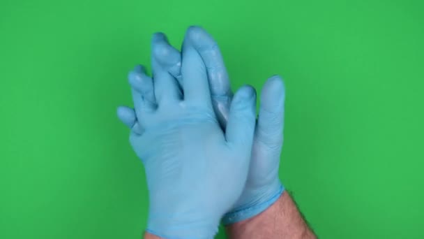 Handbehandlung Mit Antiseptikum Gummi Handschuhe Auf Grünem Hintergrund Verwendung Eines — Stockvideo