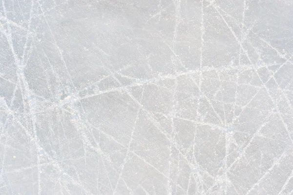 Ice textur på en åka skridskor isbanan — Stockfoto