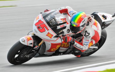 SEPANG, MALAYSIA - 25 Ekim 2009 tarihinde, San Carlo Honda Gresini takımından Alex de Angelis, Shell Advance Malezya Motorsiklet Grand Prix 'inde ısınma turu sırasında bir köşe müzakeresinde bulundu..