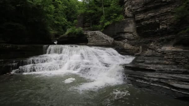 Trail over waterfall in R.H. Treman SP — Stock Video
